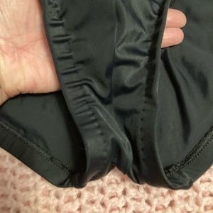 Full coverage swimsuit.